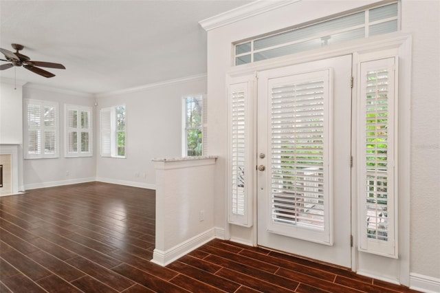 foyer featuring crown molding and ceiling fan