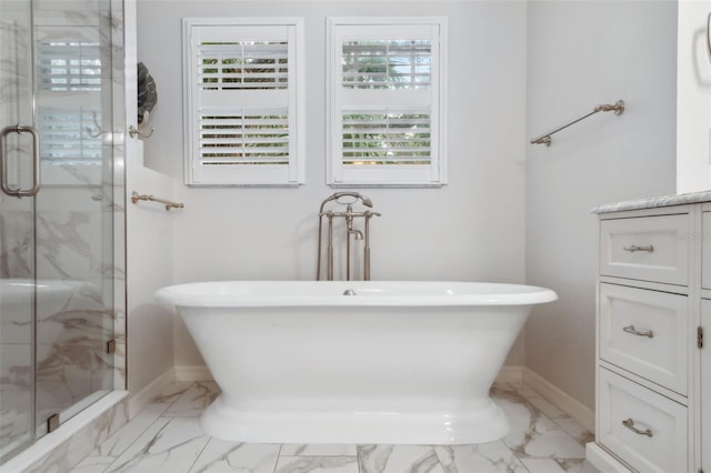 bathroom featuring independent shower and bath