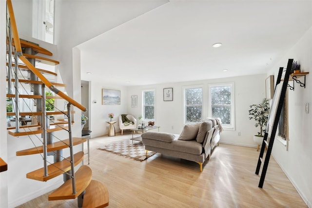 living room with light hardwood / wood-style floors