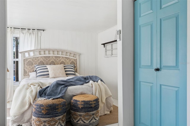 bedroom featuring carpet and a closet