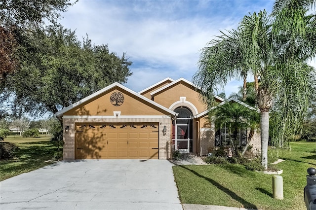 single story home with a front lawn and a garage