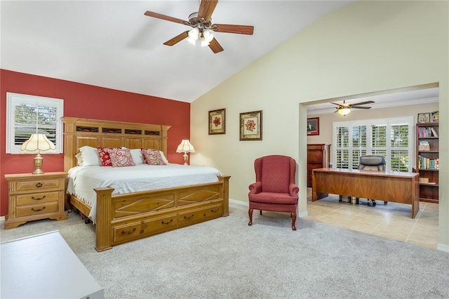 carpeted bedroom featuring ceiling fan and vaulted ceiling