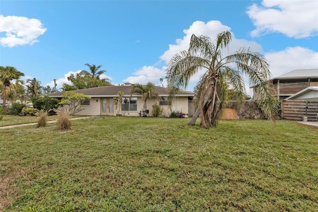 view of front of property with a front lawn