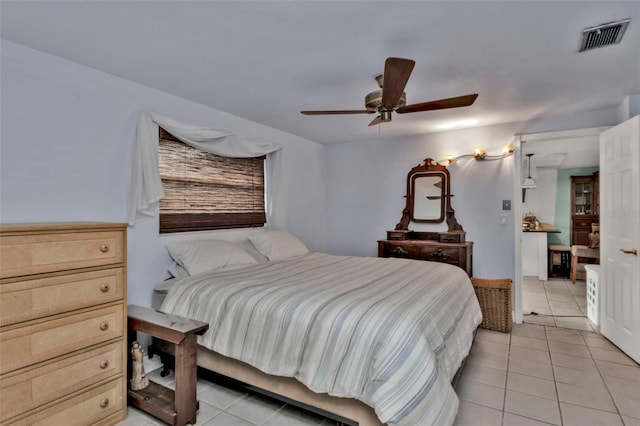 bedroom featuring ceiling fan and light tile patterned floors