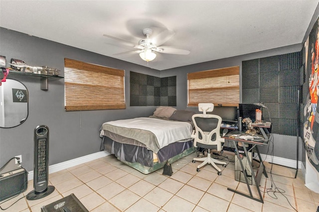 tiled bedroom with ceiling fan