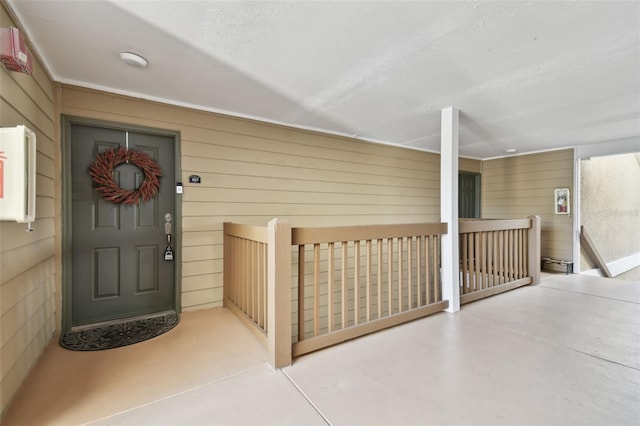 doorway to property with covered porch