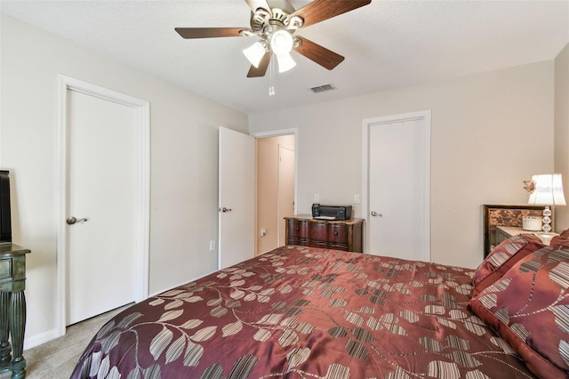 carpeted bedroom featuring ceiling fan