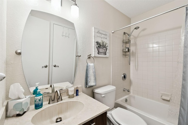 full bathroom featuring vanity, toilet, shower / bathtub combination with curtain, and a textured ceiling