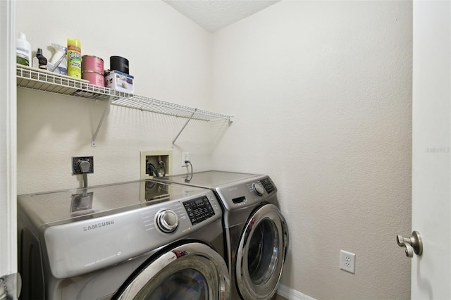 laundry area with washer and dryer