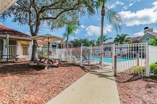 view of swimming pool with a patio area