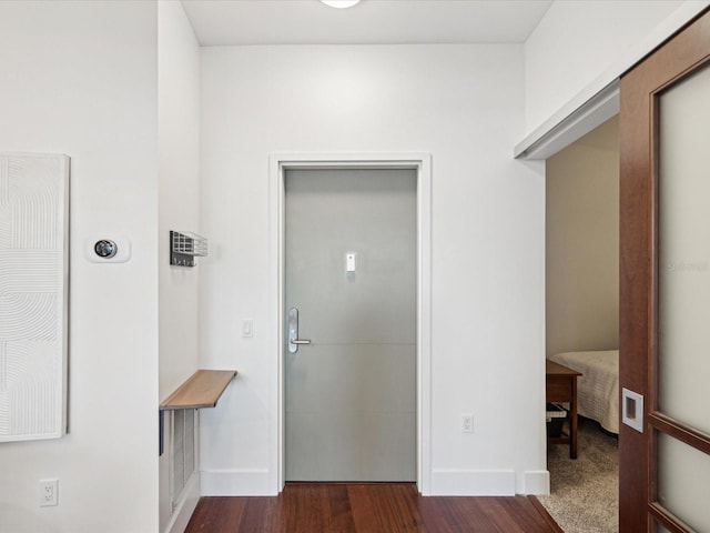 interior space featuring dark wood-type flooring