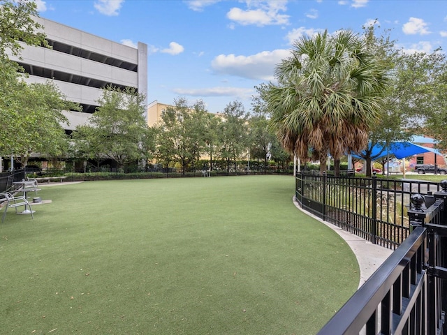 view of home's community featuring a lawn