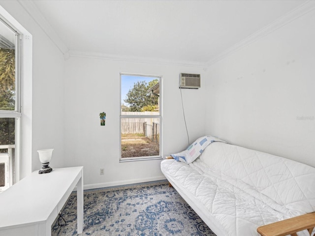 bedroom with an AC wall unit and ornamental molding