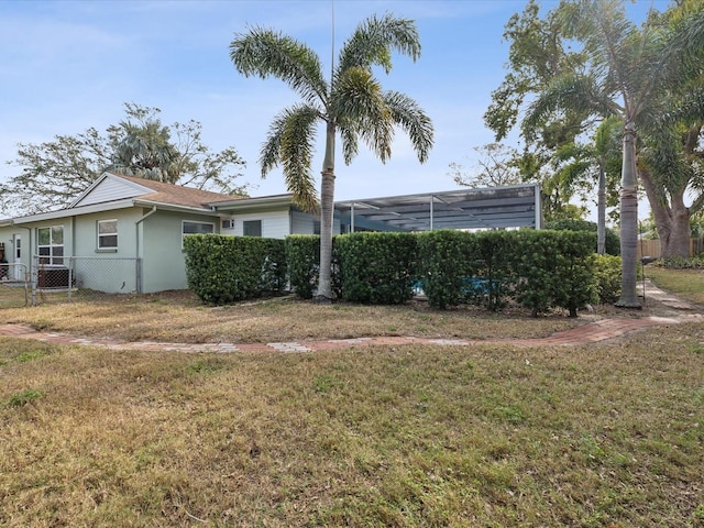 view of yard featuring a lanai