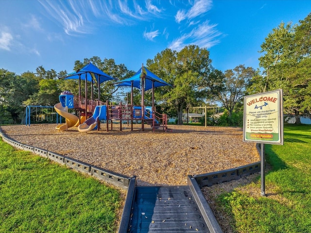 view of jungle gym featuring a yard