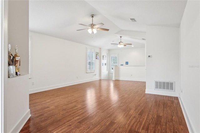 unfurnished living room featuring ceiling fan, lofted ceiling, and hardwood / wood-style flooring