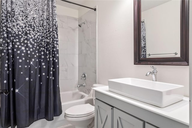 full bathroom featuring vanity, toilet, and shower / bath combo with shower curtain