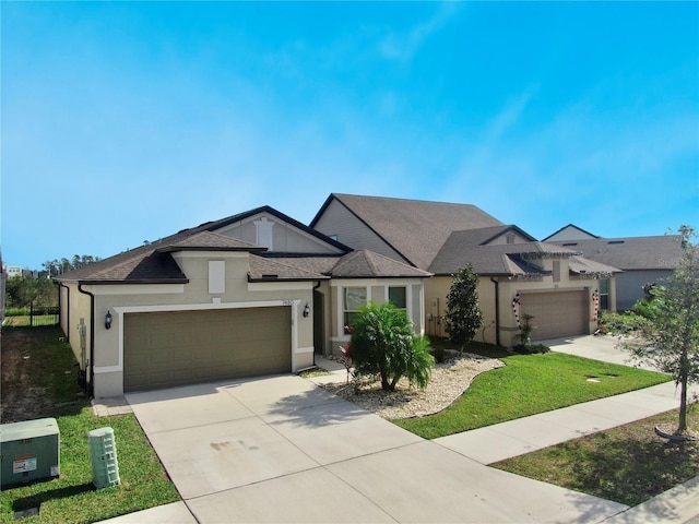 view of front of home with a garage