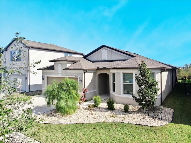 view of front of property with a front lawn