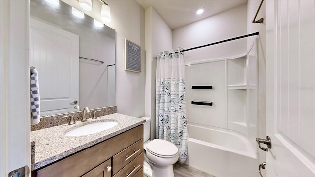 full bathroom with vanity, toilet, and shower / bath combo