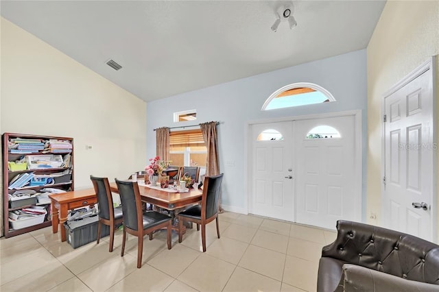 tiled dining space with a wealth of natural light