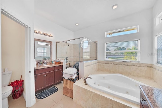 full bathroom featuring plus walk in shower, tile patterned floors, vanity, and toilet