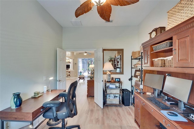 office space featuring ceiling fan and light hardwood / wood-style flooring