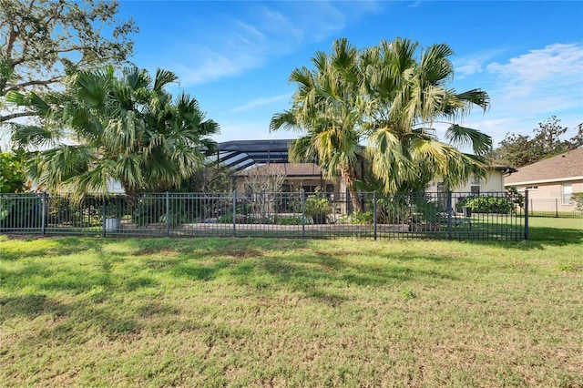 view of yard featuring a lanai