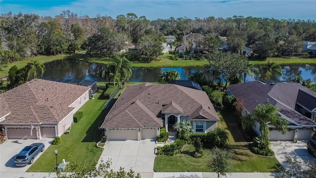 bird's eye view with a water view