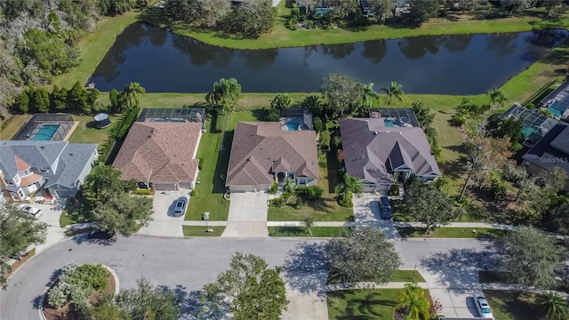 bird's eye view with a water view