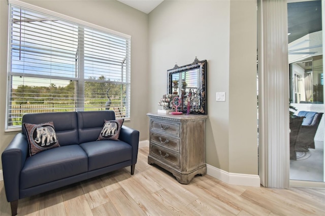 sitting room featuring light hardwood / wood-style floors