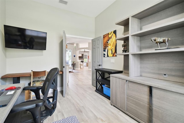 office area with light wood-type flooring