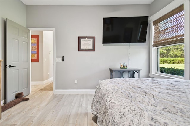 bedroom featuring light wood-type flooring