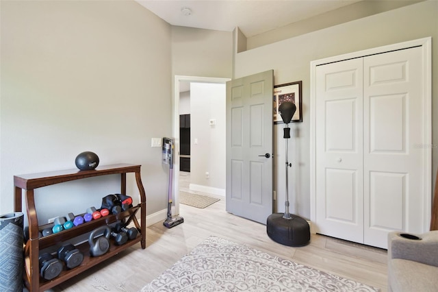 bedroom with a closet and light wood-type flooring