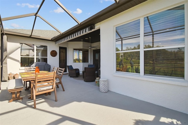 view of patio / terrace with area for grilling and ceiling fan