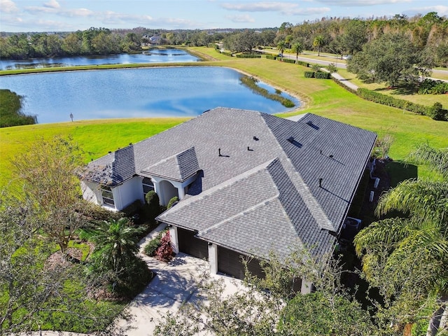 drone / aerial view featuring a water view