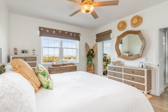 bedroom featuring ceiling fan and light wood-type flooring