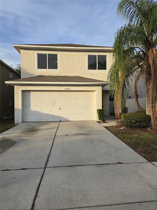 view of property with a garage