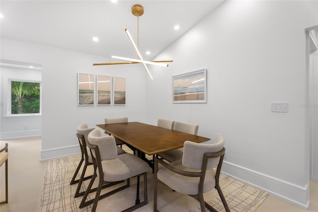 dining area featuring a notable chandelier