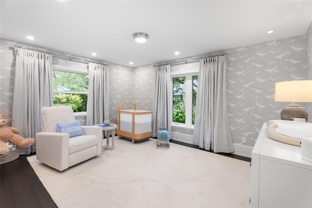 living area featuring hardwood / wood-style floors