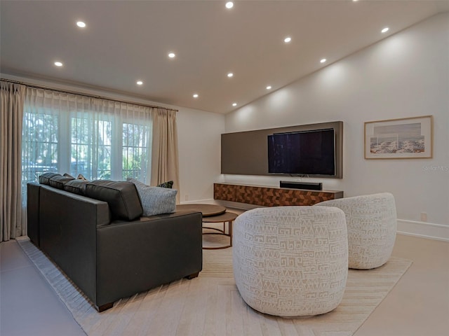 living room with lofted ceiling