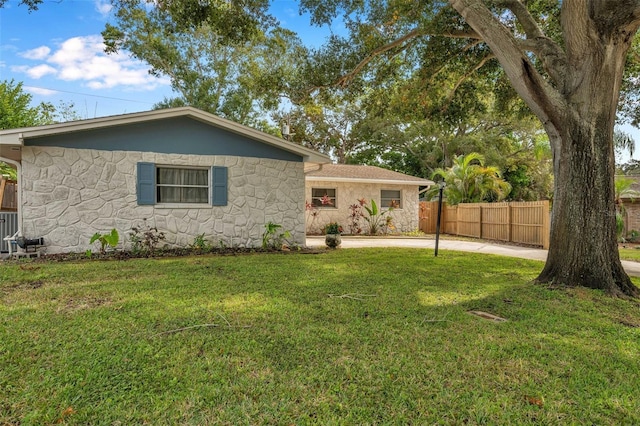 view of front of home with a front lawn