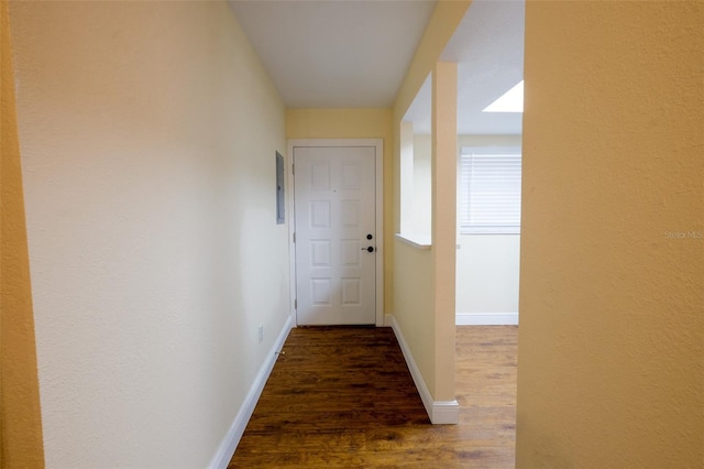 corridor featuring hardwood / wood-style flooring