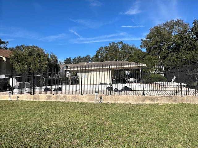 view of home's community featuring a yard