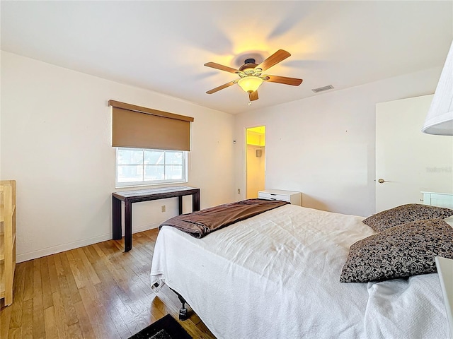 bedroom featuring light hardwood / wood-style floors and ceiling fan