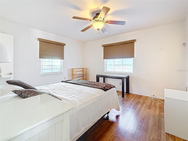 bedroom featuring ceiling fan and hardwood / wood-style floors