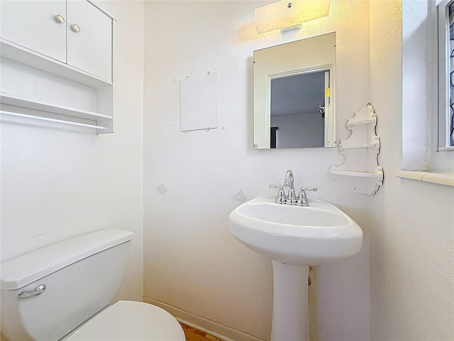 bathroom featuring toilet