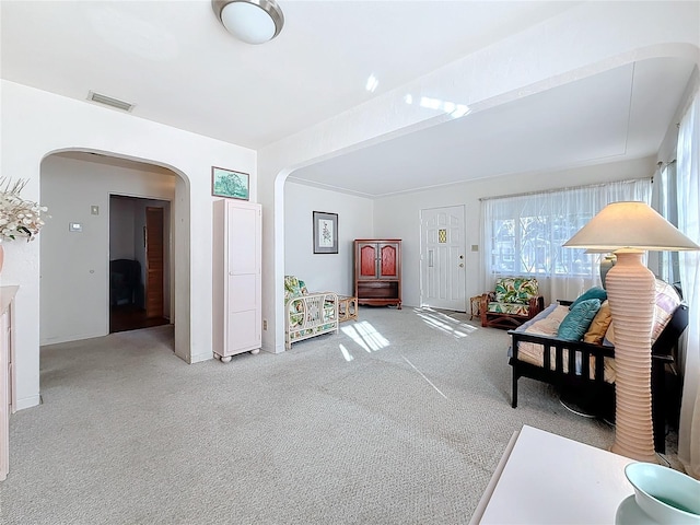 living room with light colored carpet