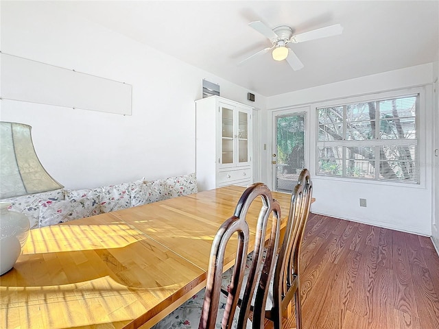 dining room featuring ceiling fan and hardwood / wood-style floors