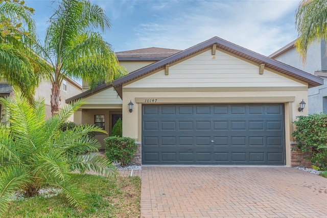 view of front of property featuring a garage